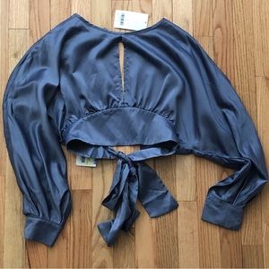 Cropped tie back blouse in a size medium.